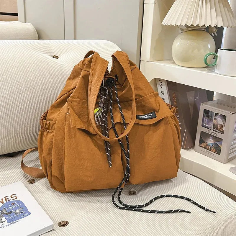 👜Large-Capacity Drawstring Convertible Tote Backpack