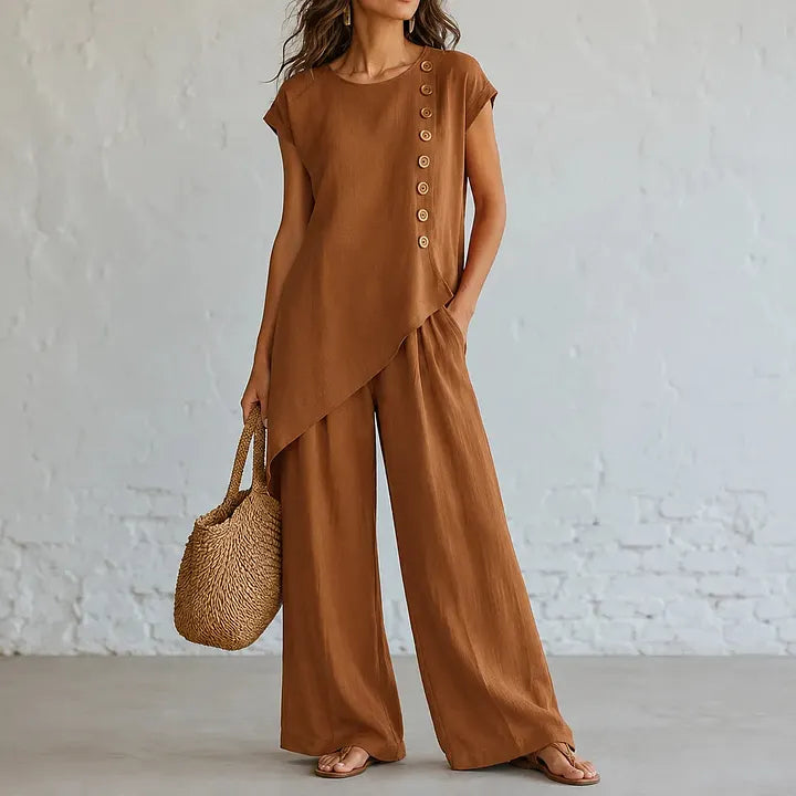 A round-neck, asymmetrical short-sleeved top and wide-leg trousers set with wooden buttons